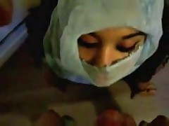 Submissive Arab woman gets facial.